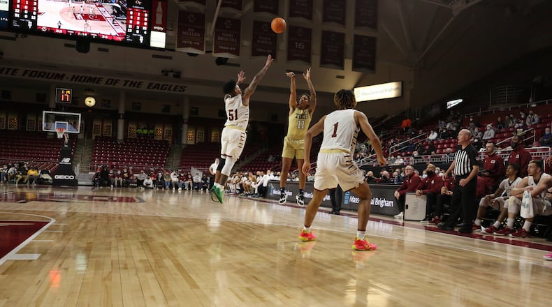 Georgia Tech guard Tristan Maxwell (shooting) attempts a 3-pointer against Boston College at Conte Forum Jan. 12, 2021. Maxwell scored a career-high 22  points for the Yellow Jackets. (Keith Swindell)