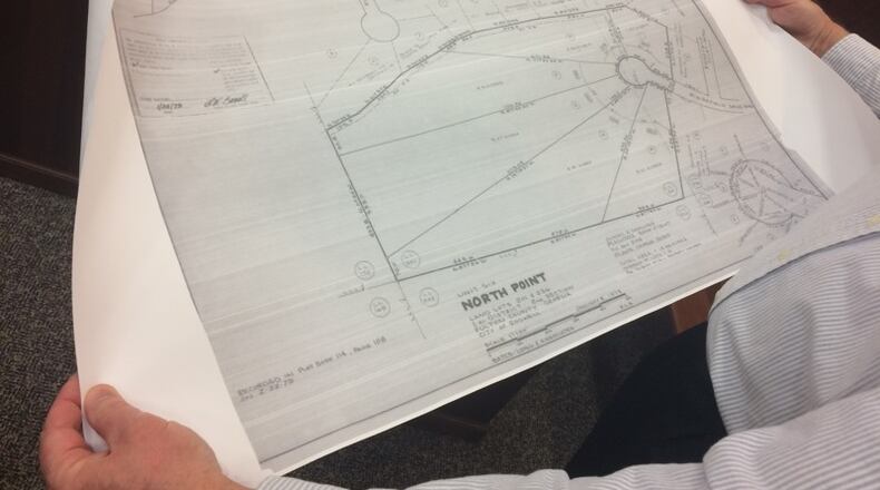 Mike Hartley, North Point resident, pointed to property plans from 1979 at a Roswell Planning Commission meeting in February. He opposes a proposed development in the neighborhood.