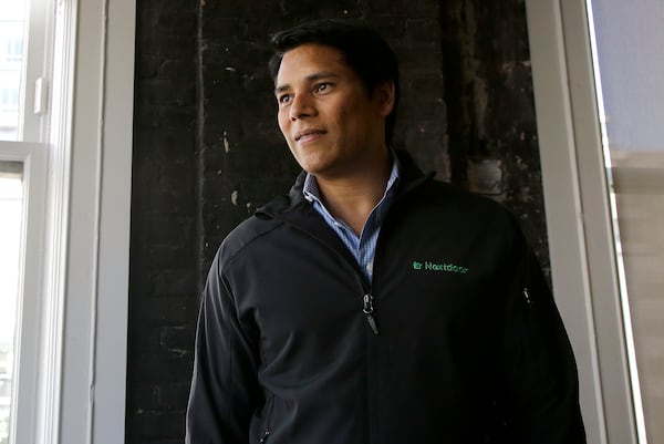 FILE - Nextdoor CEO Nirav Tolia poses for photos at his office in San Francisco on May 11, 2016. (AP Photo/Jeff Chiu, File)