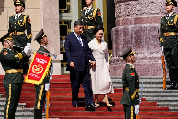 Chinese President Xi Jinping, center left, and his wife Peng Liyuan attend the welcome ceremony for Kenyan President William Ruto at the Great Hall of the People in Beijing Thursday, April 24, 2025. (Iori Sagisawa/Pool Photo via AP)
