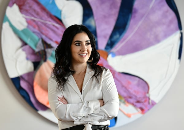 Dina Marto, an executive in the music division at UTA, at UTA's Atlanta office. (Hyosub Shin/AJC)