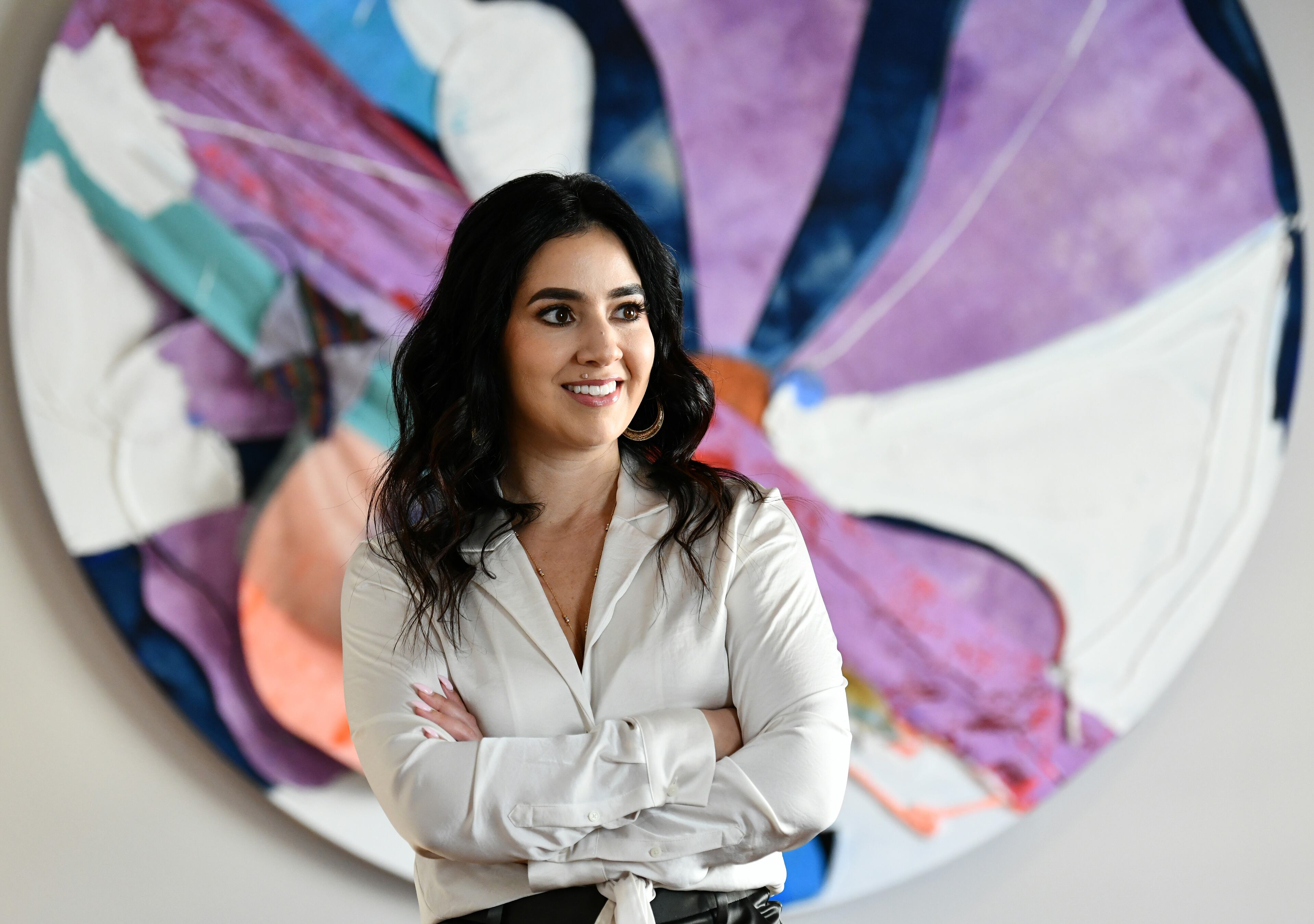 Dina Marto, an executive in the music division at UTA, at UTA's Atlanta office. (Hyosub Shin/AJC)