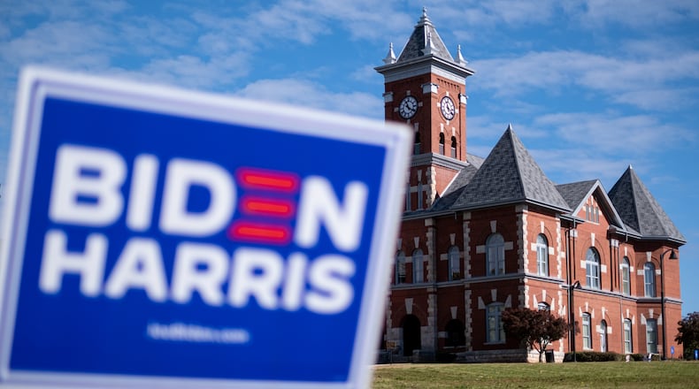 201106-Jonesboro-A Biden-Harris sign stands on the lawn in front of the Historic Clayton County Courthouse in Jonesboro on Friday morning, Nov. 6, 2020 after the county pushed Joe Biden into the lead in Georgia election results. (Ben Gray for the Atlanta Journal-Constitution)