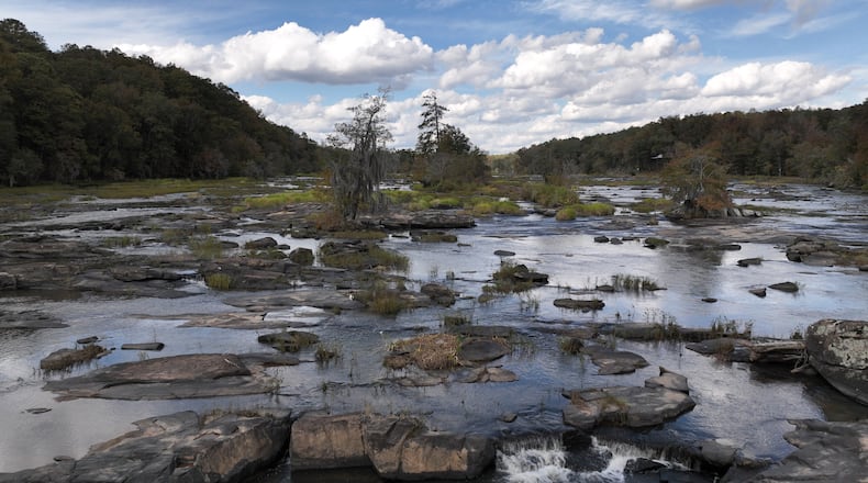 Aerial photograph shows Yellow Jacket Shoals, in the Flint River, Thursday, October 19, 2023, in Thomaston. A legal battle over property rights and fishing on the Flint River could have implications for public access to waterways across the state. Recently, two property owners directly across from each other on the Flint River in Upson County and Talbot County, about two hours south of Atlanta, have sued the state to block the public from fishing the shoals that lie between them. (Hyosub Shin / Hyosub.Shin@ajc.com)
