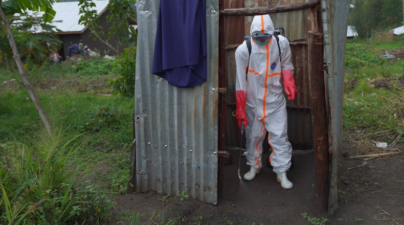 Wiza Bondele, a health worker on the prevention and control team, is seen at work in Ituri province, eastern Congo, Wednesday, Aug 5, 2026. (AP Photo/Dieudonne Dirole)
