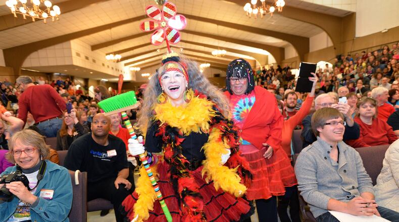 Karen Parker (center), a leader for today's performance, and other members of Seed & Feed Marching Abominable Band, perform during the 36th Annual Groundhog Day Jugglers Festival at the Yaarab Shrine Center in Atlanta on Saturday, February 1, 2014.