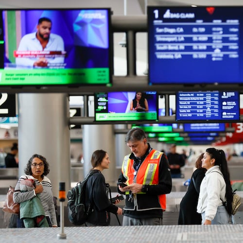 Travelers walk around baggage claim in the South Terminal at Hartsfield-Jackson Atlanta International Airport on Thursday, Nov. 6, 2025.
(Miguel Martinez/ AJC)