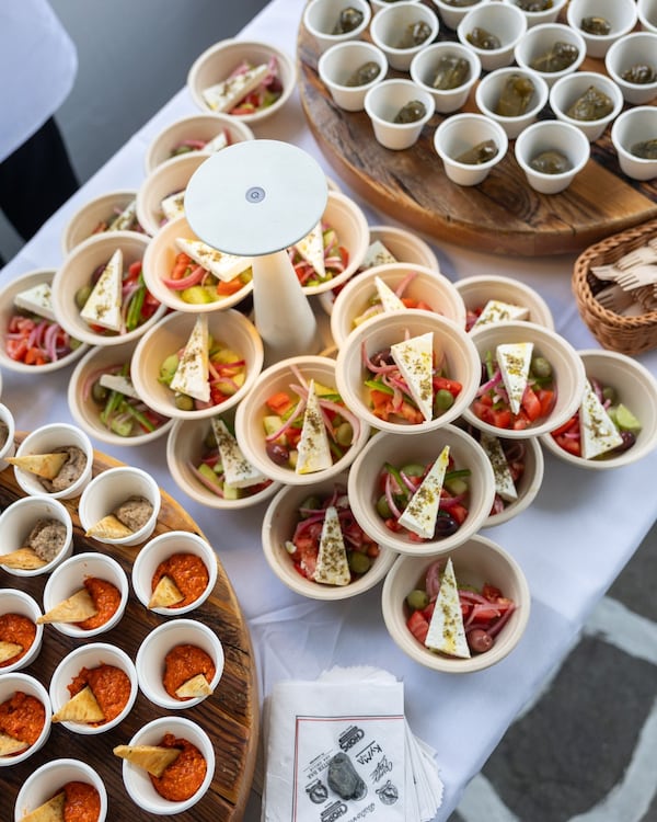 Attend the annual Kyma Champagne Social featuring glasses of Champagne and food to pair with it. (Courtesy of Kyma)