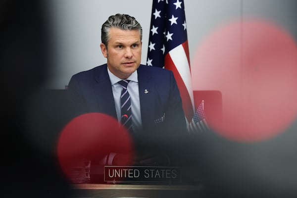 U.S. Defense Secretary Pete Hegseth addresses a meeting of the Ukraine Defense Contact Group at NATO headquarters in Brussels on Wednesday. (Omar Havana/AP)