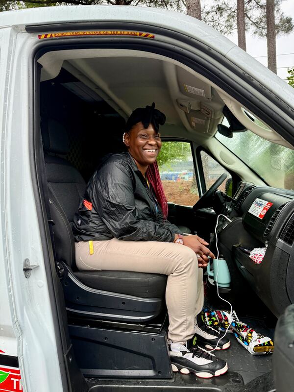 Sheronda Robertson, 35, said "Once you get sucked into staying at a hotel, it's hard to get out." The mother of four lives paycheck to paycheck, sometimes paying her family's hotel bill one day at a time. (Danielle Charbonneau/AJC)