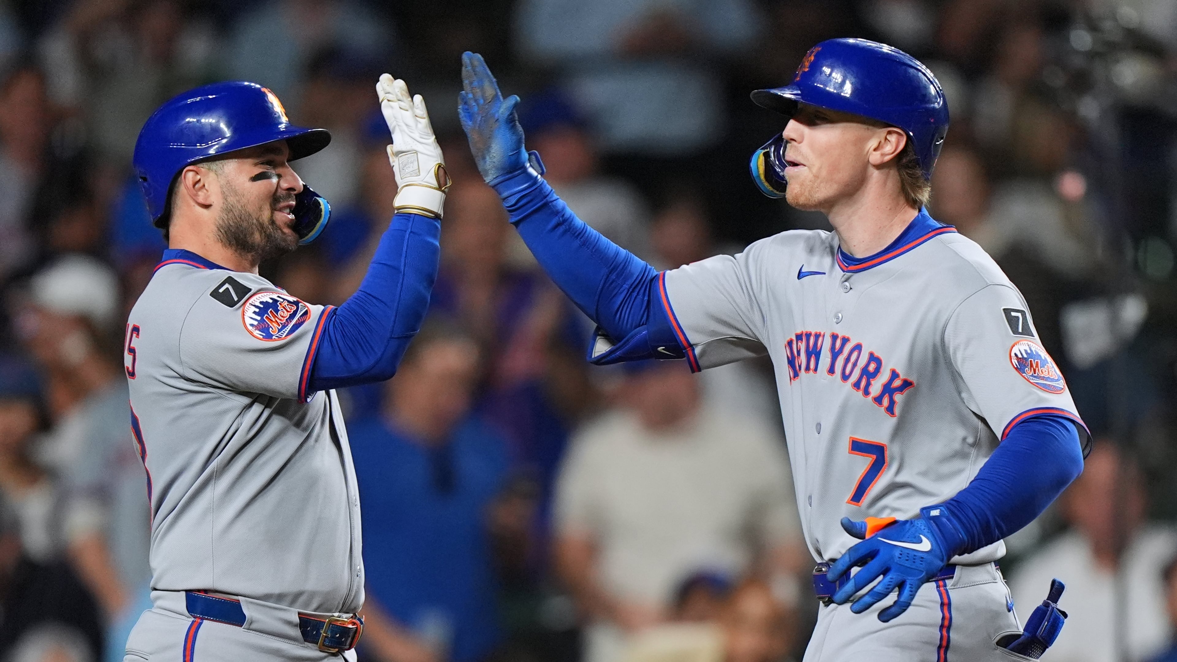 New York Mets' Brett Baty, right, celebrates with Luis Torrens after hitting a three-run home run during the fourth inning of a baseball game against the Chicago Cubs in Chicago, Thursday, Sept. 25, 2025. (AP Photo/Nam Y. Huh)