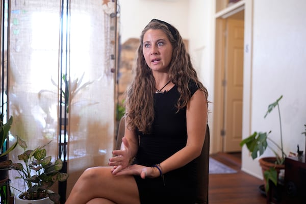 FILE - Kyleigh Thurman, one of the patients who filed a federal complaint against an emergency room for not treating her ectopic pregnancy, talks about her experience at her studio, Aug. 7, 2024, in Burnet County, Texas. (AP Photo/Eric Gay, File)