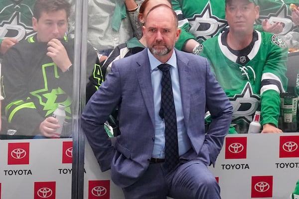 Dallas Stars head coach Peter DeBoer looks on during the third period in Game 2 of the Western Conference finals in the NHL hockey Stanley Cup playoffs, Friday, May 23, 2025, in Dallas. (AP Photo/LM Otero)