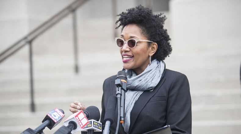 Taifa Smith Butler, executive director of Georgia Budget and Policy Institute, speaks Nov. 4 during a press conference, following an announcement by Gov. Brian Kemp where he proposed limited expansion of Medicaid in Georgia. (Alyssa Pointer/Atlanta Journal-Constitution)