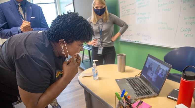 Superintendent Lisa Herring talks with Kiersten Hellier-Hunter's 7th-grade class over zoom on the first day of class at David T. Howard Middle School, Monday, August 25, 2020. STEVE SCHAEFER FOR THE ATLANTA JOURNAL-CONSTITUTION