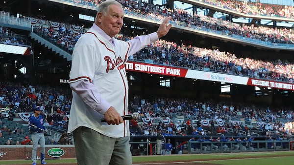 Legendary Braves manager Bobby Cox waves to the fans after announcing play ball during the home opener on Monday, April 1, 2019, in Atlanta. Cox was hired to manage the Braves in 1977. (Curtis Compton/AJC)