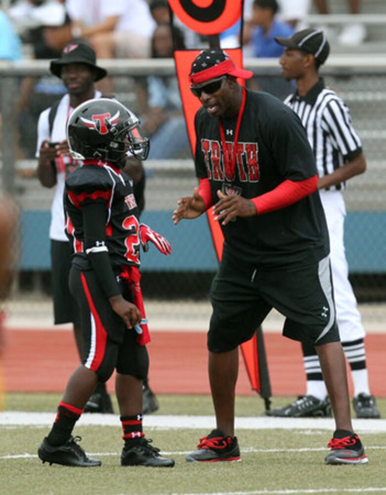 Heading for hall of fame, Deion coaches youth