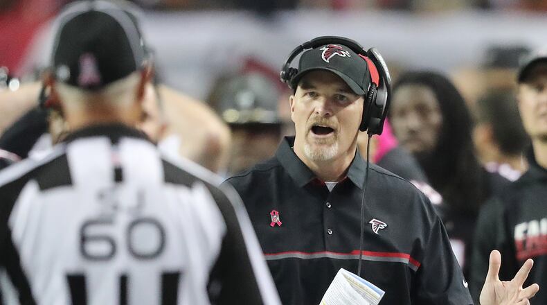 Falcons head coach Dan Quinn lobbies an official for a call during last month’s game against San Diego. (Curtis Compton /ccompton@ajc.com)