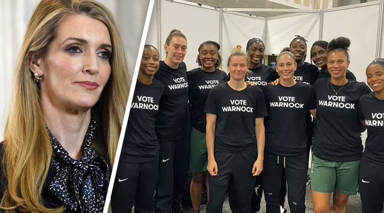 Sen. Kelly Loeffler, R-Georgia, waits to speak in a television interview on Capitol Hill in Washington. WNBA players have urged people to vote against Loeffler, a co-owner of the league's Atlanta Dream.
