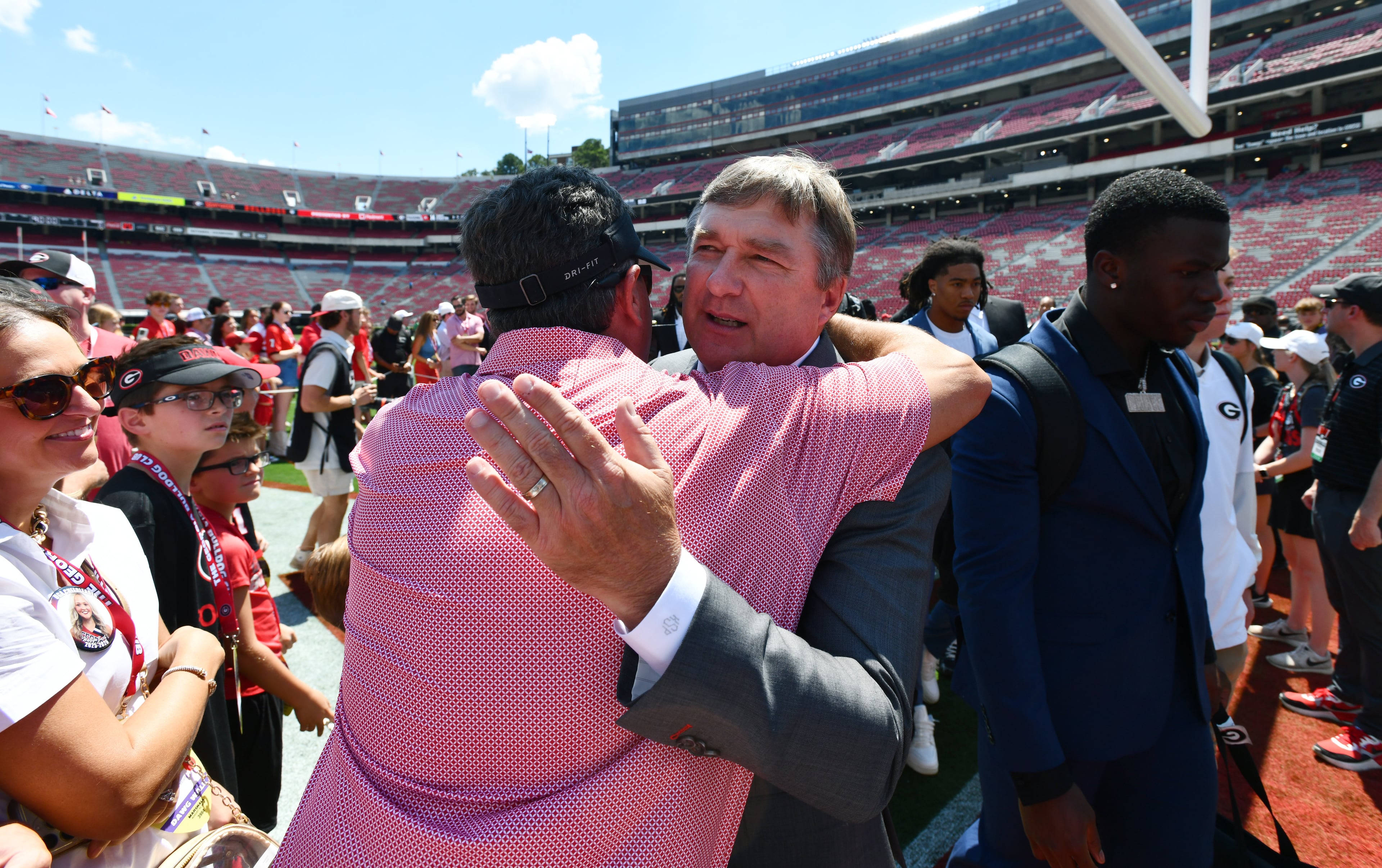 Georgia head coach Kirby Smart is greeted by fans during the Dawg Walk before Georgia football's season opener and home opener against Marshall at Sanford Stadium, Saturday, August 30, 2025, in Athens. (Hyosub Shin / AJC)