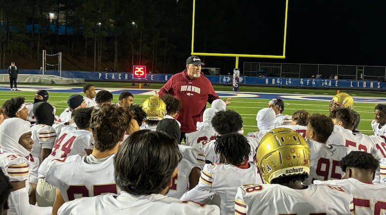 Interim Brookwood coach Chad Nighbert addresses his team after a 32-29 win over Peachtree Ridge, Oct. 18, 2024, in Lawrenceville. Brookwood hired Nighbert as its permanent coach in January.