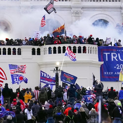 FILE - Rioters storm the West Front of the U.S. Capitol Jan. 6, 2021, in Washington. (AP Photo/John Minchillo, File)
