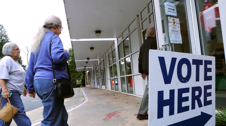 Nov. 3, 2015 - DeKalb County - Precinct workers were pleased with the turnout at In Hawthorne Elementary, where city hood for LaVista Hills was on the ballot, with 275 voters by 11am. DeKalb County residents could vote on an ethics overhaul for the county and city hood for LaVista Hills and Tucker. Hawthorne Elementary is one of the busiest precincts in DeKalb, where voters will consider overhauling the county's ethics rules and city hood for LaVista Hills. BOB ANDRES / BANDRES@AJC.COM