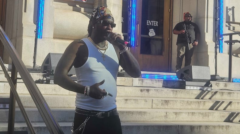 Rapper Young Thug performs a free concert/anti-gang presentation on the steps of the Fulton County Courthouse on Sept. 28, 2025. (DeAsia Paige/AJC)