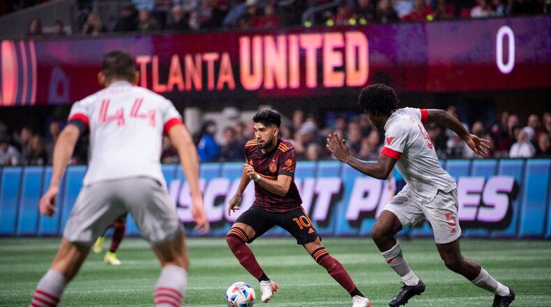 Atlanta United midfielder Marcelino Moreno #10 dribbles the ball during the match against Toronto FC at Mercedes-Benz Stadium in Atlanta, Georgia on Saturday October 30, 2021. (Photo by Dakota Williams/Atlanta United)
