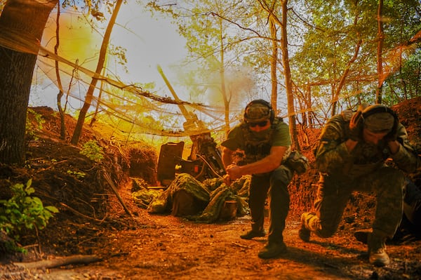 FILE - In this photo provided by Ukraine's 127th Separate Brigade of the Territorial Defense press service, soldiers fire toward Russian army positions near Kharkiv, Ukraine, on Monday, June 2, 2025. (Anatolii Lysianskyi/Ukraine's 127th Separate Brigade via AP, File)