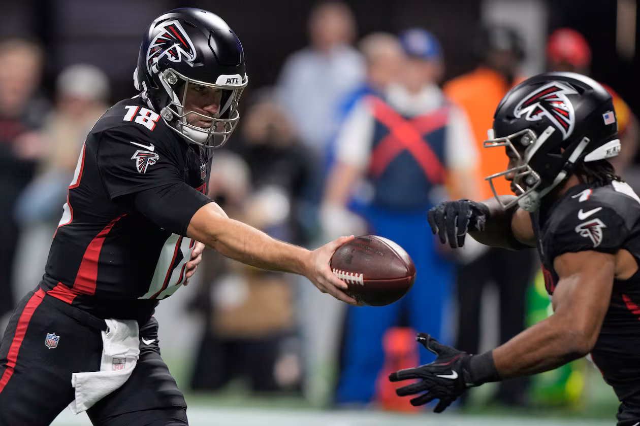 Atlanta Falcons running back Bijan Robinson passed 2,000 yards from scrimmage in the third quarter against the Arizona Cardinals on Sunday, becoming the third Falcon to accomplish that feat. (Brynn Anderson/AP)