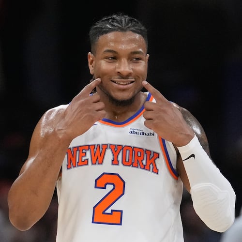 New York Knicks guard Miles McBride reacts during the second half of Game 4 in the Eastern Conference finals NBA basketball playoffs series against the Cleveland Cavaliers in Cleveland, Monday, May 25, 2026. (AP Photo/Sue Ogrocki)