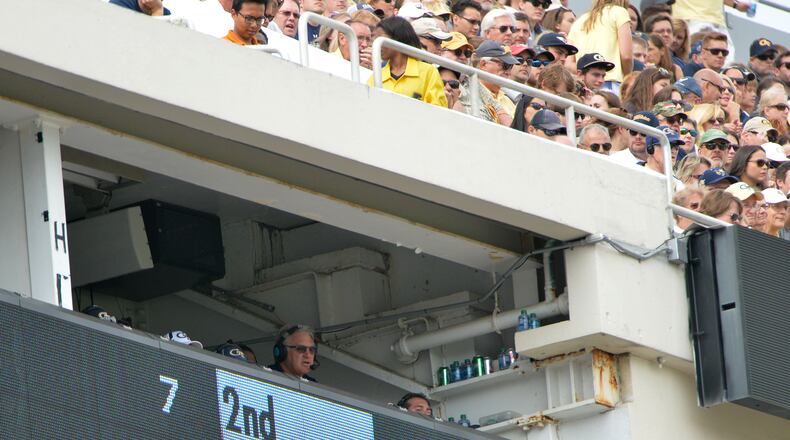 Defensive coordinator Ted Roof returned to the coaching box Saturday, calling plays from that loft for the first time this season. (AJC photo by Hyosub Shin)