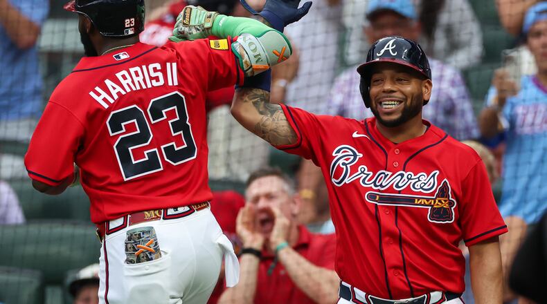Atlanta Braves' Michael Harris II (23) reacts with Dominic Smith, right, after hitting a two-run home run in the second inning of a baseball game against the New York Mets, Friday, July 3, 2026, in Atlanta. (AP Photo/Colin Hubbard)