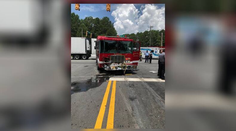 The driver of a Walton County firetruck did not use "proper due regard" when entering the intersection of Ga. 138 and Miller Bottom Road and hit a Ford F-250, according to the Georgia State Patrol.