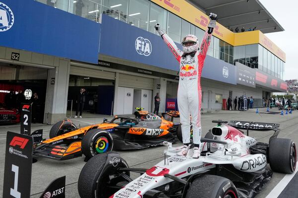 Red Bull driver Max Verstappen of the Netherlands celebrates after the Japanese Formula One Grand Prix at the Suzuka Circuit in Suzuka, central Japan, Sunday, April 6, 2025. (AP Photo/Shuji Kajiyama)