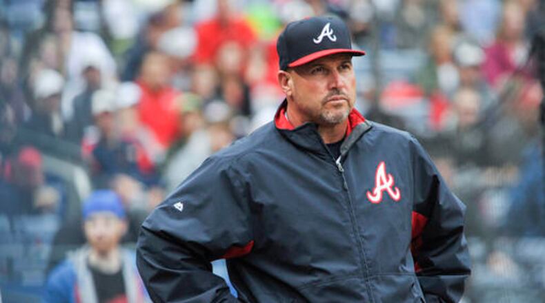 FILe - In this Oct. 4, 2015, file photo, Atlanta Braves manager Fredi Gonzalez (33) waits for a review of a call during the fourth inning of the second baseball game of a doubleheader against the St. Louis Cardinals, in Atlanta. The Atlanta Braves have fired manager Fredi Gonzalez, who couldn�t survive the worst record in the majors. Braves general manager John Coppolella confirmed the firing of Gonzalez, in his sixth season, Tuesday, May 17, 2016. (AP Photo/John Amis, File)