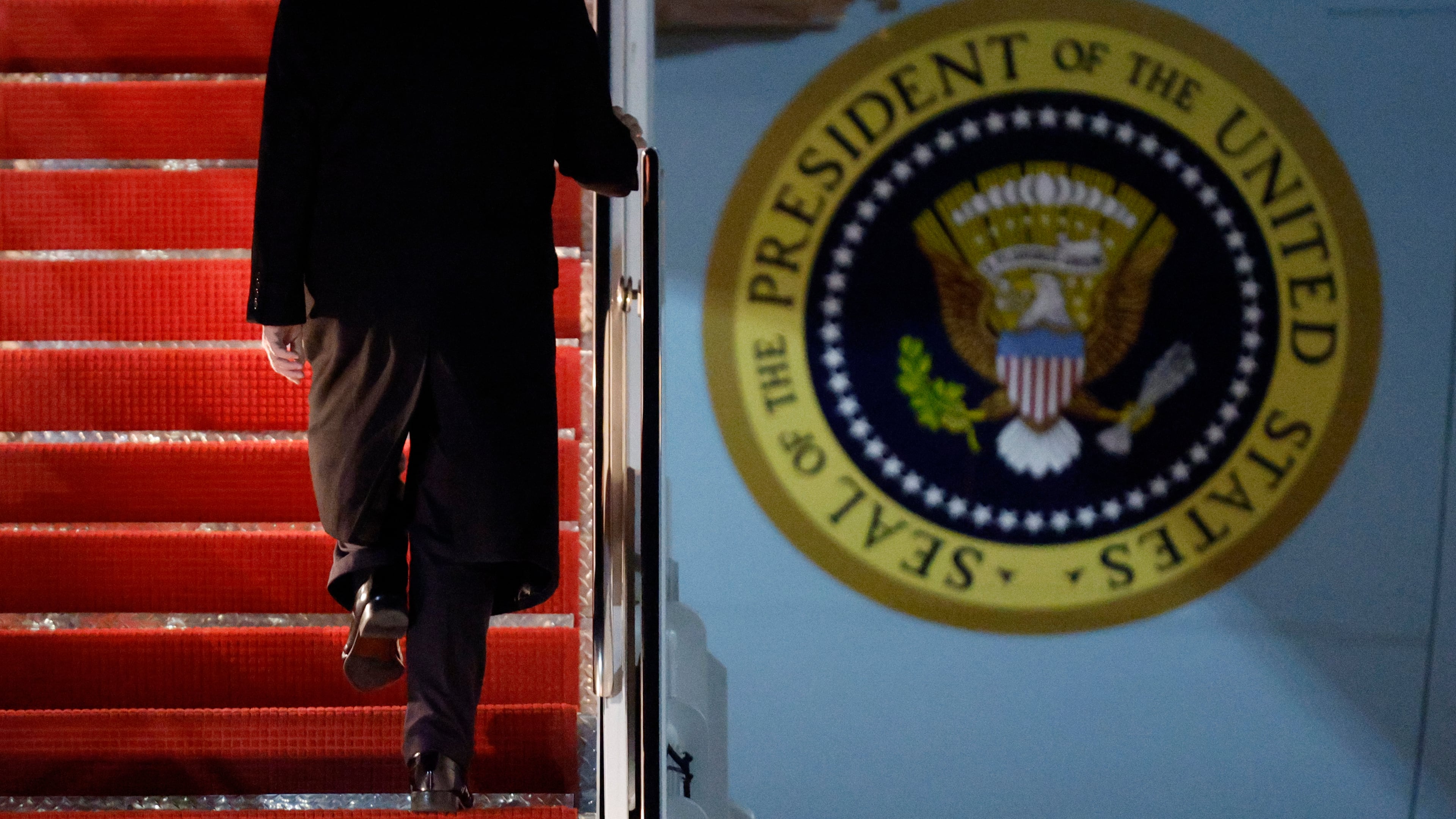 President Donald Trump walks up the stairs of Air Force One as he boards upon his arrival at Joint Base Andrews, Md., Friday, Nov. 7, 2025, en route to his Mar-a-Lago estate in Palm Beach, Fla. (AP Photo/Luis M. Alvarez)