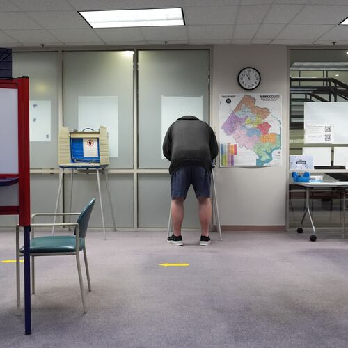 A person early votes in the Virginia redistricting referendum at the Fairfax County Government Center, Friday, April 3, 2026, in Fairfax, Va. (AP Photo/Julia Demaree Nikhinson)