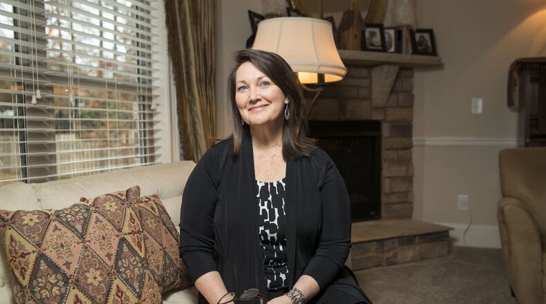 Bonnie Shekarabi poses for a portrait at her Clayton County residence. Bonnie and her family moved from the Johns Creek community two and a half years ago. She enjoys the diversity in Jonesboro and iis one of many who are taking advantage of the county’s proximity to the airport, cheaper home prices and quicker access to downtown Atlanta at a time when the metro is becoming more gridlocked. ALYSSA POINTER/ALYSSA.POINTER@AJC.COM