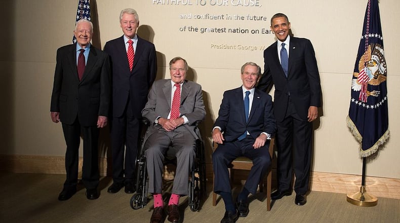 FILE PHOTO: In this handout provided by the George W. Bush Presidential Center, former U.S. presidents (L-R) Jimmy Carter, Bill Clinton, George H.W. Bush, George W. Bush and President Barack Obama pose at the opening of the George W. Bush Presidential Center April 25, 2013 in Dallas, Texas. (Photo by Paul Morse/George W. Bush Presidential Center via Getty Images)