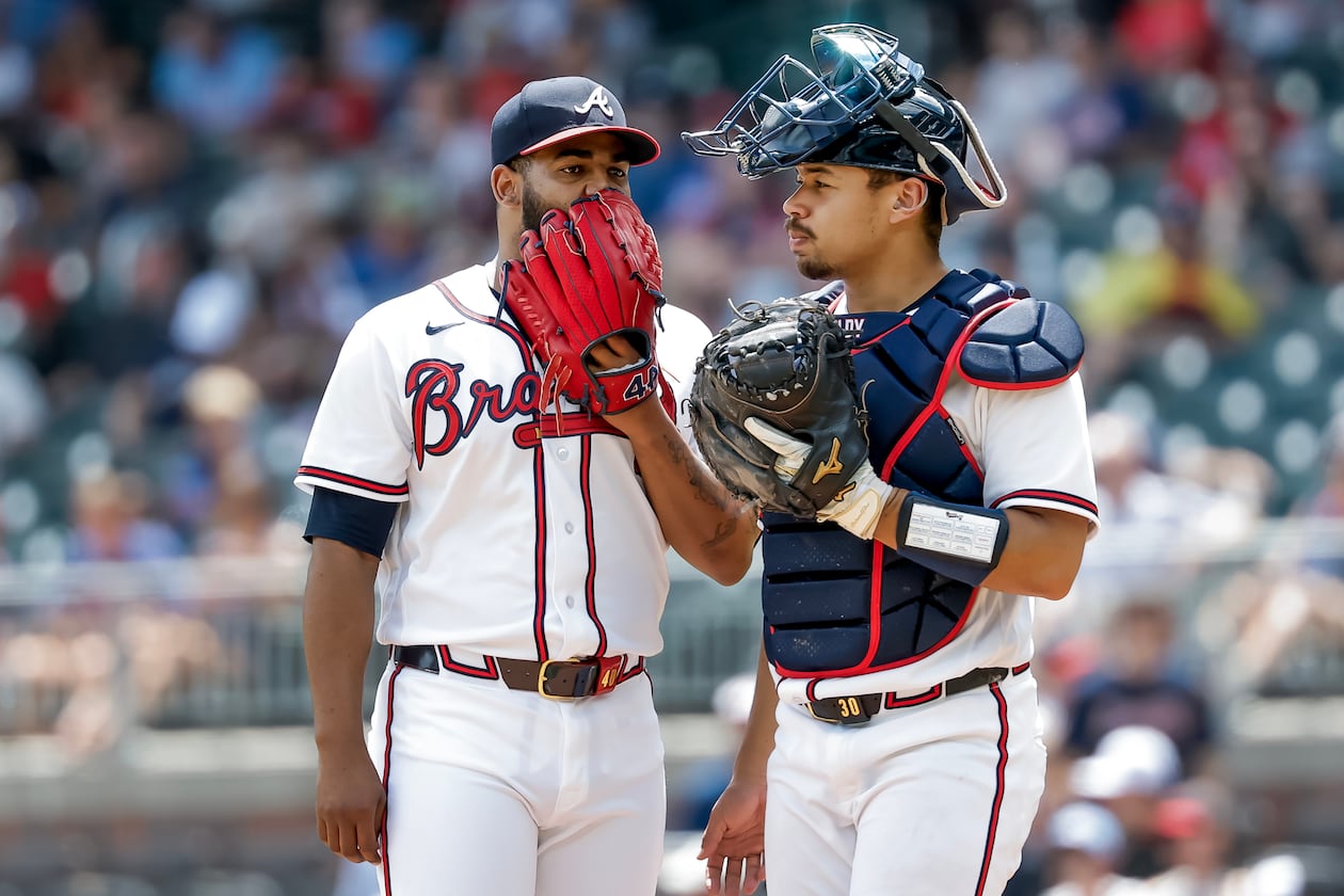 Braves catcher Drake Baldwin (right) speaks with pitcher Reynaldo López during the sixth inning against the Giants on Wednesday, June 17, 2026, in Atlanta. (Erik S. Lesser/AP)
