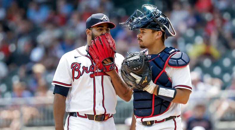 Braves catcher Drake Baldwin (right) speaks with pitcher Reynaldo López during the sixth inning against the Giants on Wednesday, June 17, 2026, in Atlanta. (Erik S. Lesser/AP)
