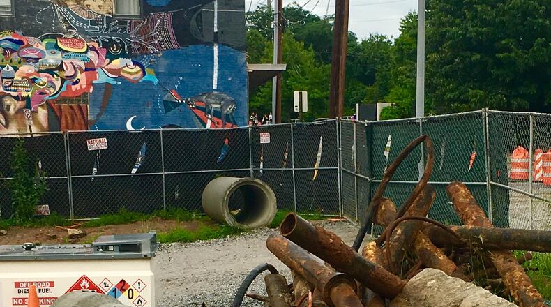 Some of the brand new reinforced concrete pipes that will help finish up Decatur’s downtown storm water project that dates back to 2006. In the background are some old ductile iron water lines that were removed when the city’s contractor relocated a water line on North Candler Street. The downtown storm water network, which goes from the Beacon Municipal Center to Barry Street, should finish by July 1. Bill Banks for the AJC