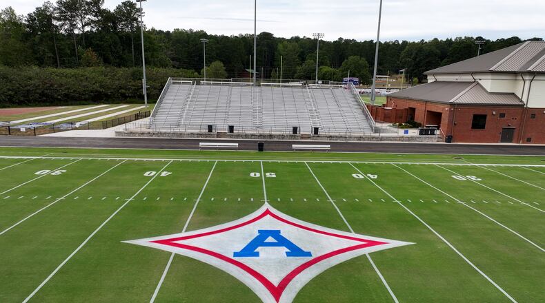 A big “A” logo has been painted on the 50-yard line for a tribute to Apalachee High School ahead of Jefferson High School’s home football game against Stephens County at Jefferson Memorial Stadium, Friday, September 6, 2024, in Jefferson. (Hyosub Shin / AJC)