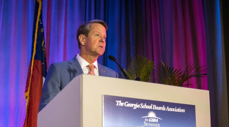 Gov. Brian Kemp, during an interview Monday, backed a bill to expand funding for private school vouchers. (AJC Photo/Stephen B. Morton)