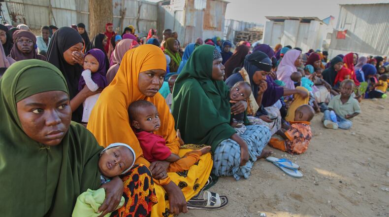 Somali women displaced by drought sit at Feynuus Nutrition Centre on the outskirts of the capital, Mogadishu, Somalia Wednesday, Aug. 19, 2026. (AP Photo/Farah Abdi Warsameh)