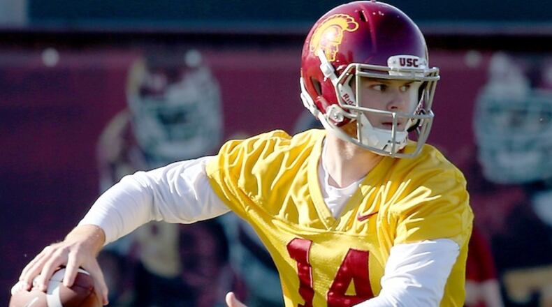 USC quarterback Sam Darnold runs through drills on the first day of spring practice at Howard Jones Field in Los Angeles on March 7, 2017. (Luis Sinco/Los Angeles Times/TNS)