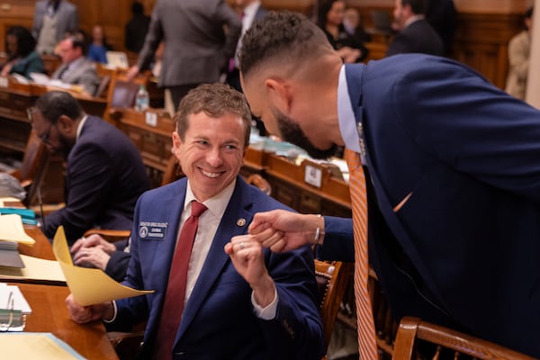 State Sen. Greg Dolezal, the Republican nominee for lieutenant governor, seen here greeting state Sen. RaShaun Kemp, D-Atlanta, at the Georgia Capitol last year. (Arvin Temkar/AJC)