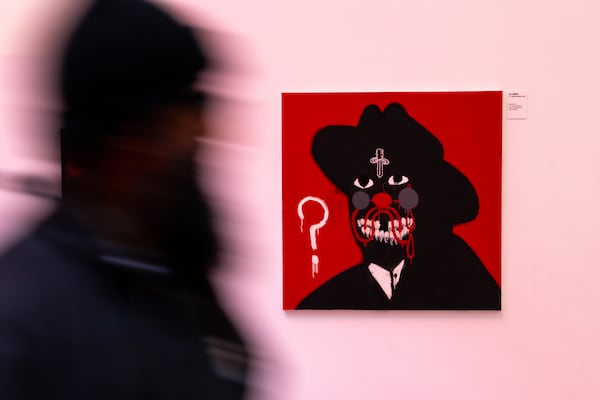 Artwork by British-Nigerian artist Slawn, inspired by rapper 21 Savage, appears at a one-night popup at the High Museum of Art in Atlanta on Friday. Slawn designed the cover for 21 Savage’s” new album, "What Happened to the Streets?" (Arvin Temkar/AJC)